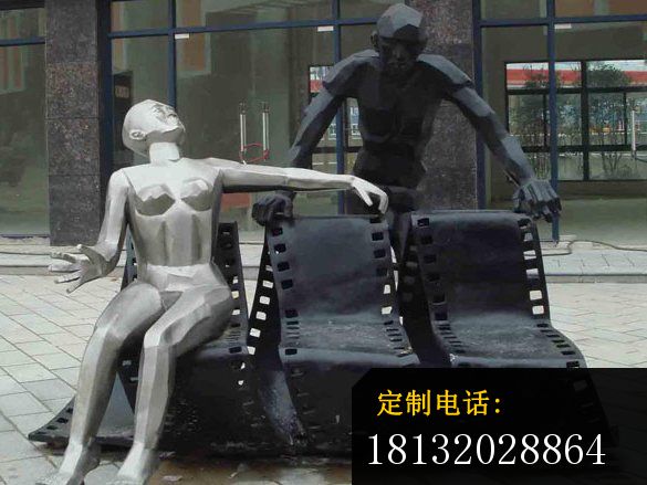 不锈钢人物雕塑，不锈钢影院门口雕塑_585*439