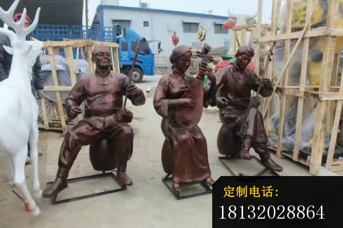 街头卖艺人物铜雕[1]_700*465