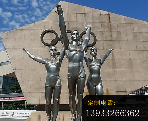 广场不锈钢运动员和五环雕塑_600*490